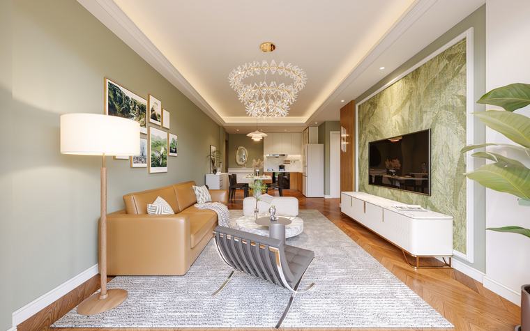 Living room with sage walls, leather sofa and open kitchen beyond