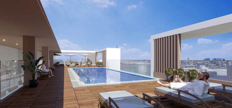 Rooftop swimming pool with timber deck and loungers